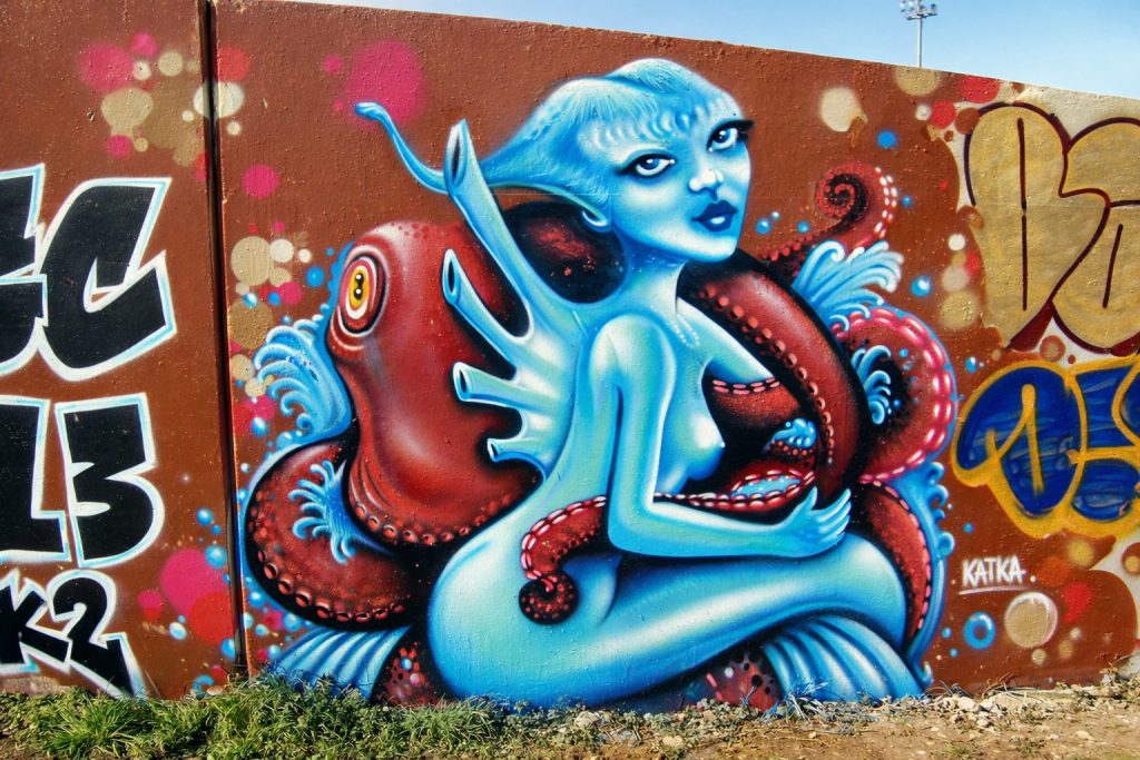 Mermaid playing octopuss